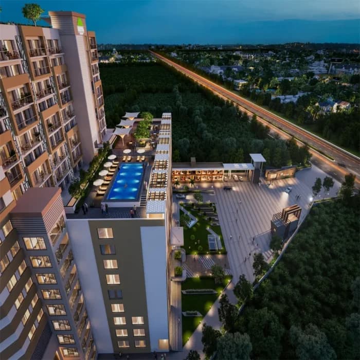 A Motia Group residential development at dusk